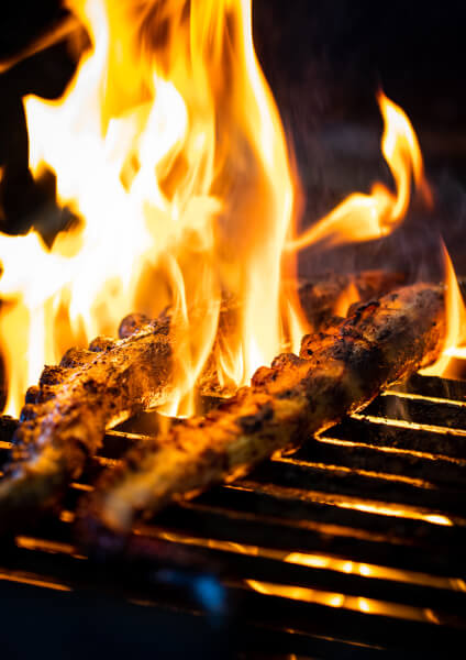 Octopus on open flame grill